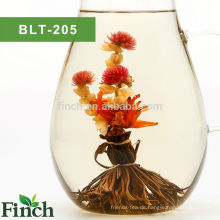 Finch Hot Sale Blooming schwarzer Tee Peacock Spread seinen Schwanz mit Lily und Jasmine Flower